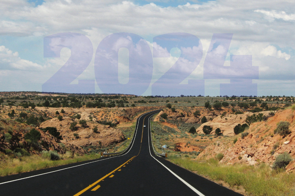 Image of a rural road in Arizona with the date 2024 superimposed on the sky.